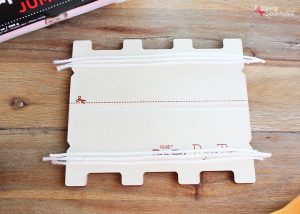 Bucilla RyaTie is the easiest way to make pom-poms for home decor projects!