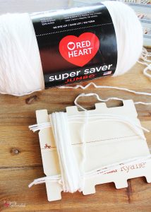 Bucilla RyaTie is the easiest way to make pom-poms for home decor projects!