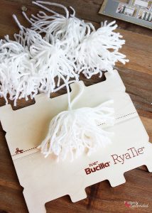 Bucilla RyaTie is the easiest way to make pom-poms for home decor projects!