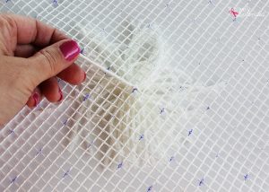 Bucilla RyaTie is the easiest way to make pom-poms for home decor projects!