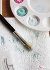 Stenciled Bulletin Board - Turn an inexpensive IKEA bulletin board into fun DIY decor for organizing any space!