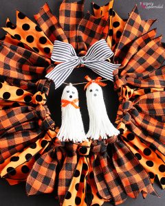 Halloween Ribbon Wreath -- So easy to make with an embroidery hoop, and these ghost tassel embellishments are adorable!