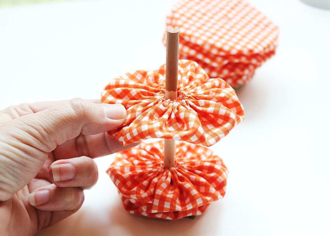 Stack Yo Yos on Dowel