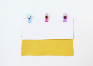 Clip White Piece to Orange and Yellow Piece
